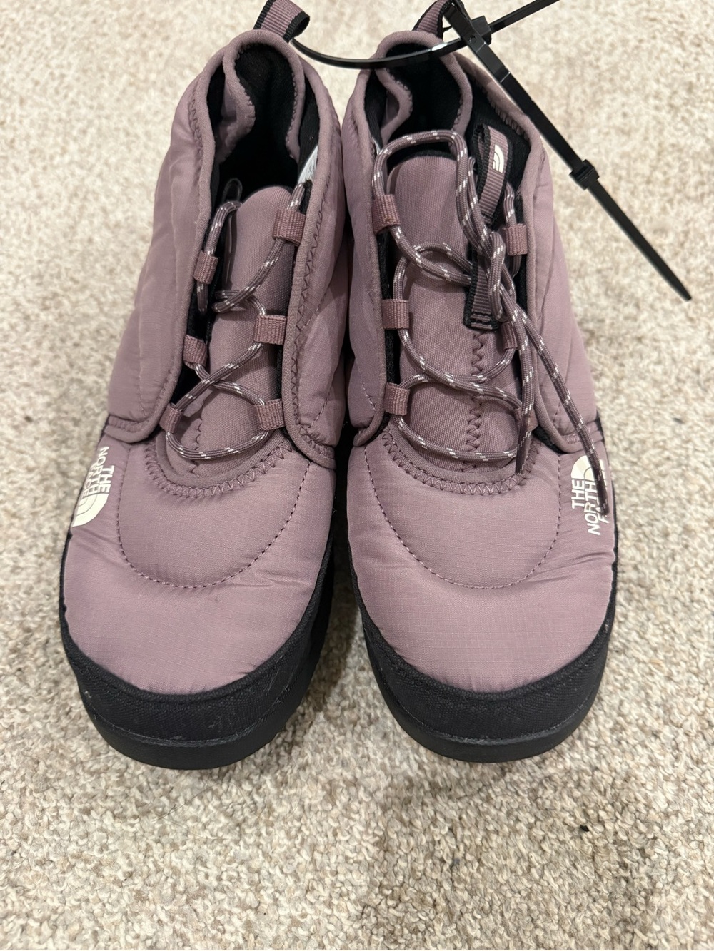 The North Face Mauve Slip-On Winter Boots with Black Outsole and Bungee Lacing